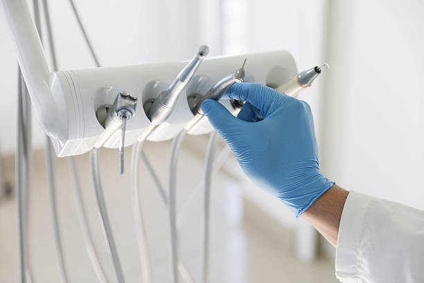 Professional Invisalign Clear Aligners technician working in Flanders, NY